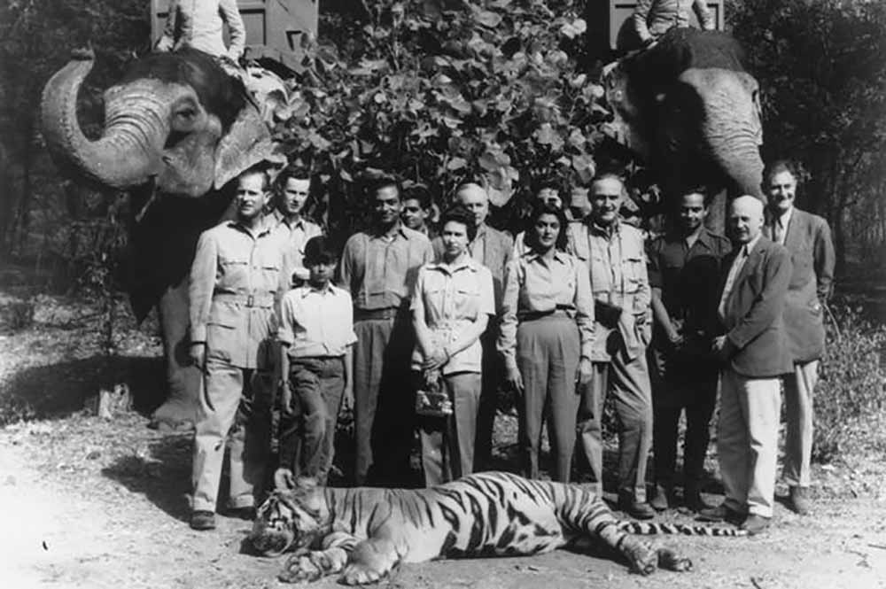 Prince Philip & queen with hunting party and dead tiger